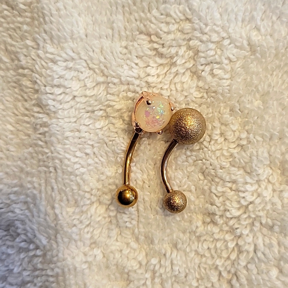 NWOT Bellybutton ring set rose gold color